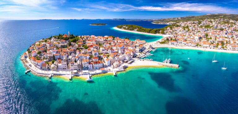 Picturesque town and beaches of Primosten panoramic aerial view